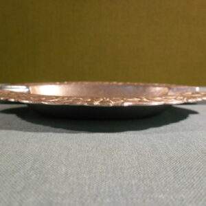 Metalen asbak met afbeelding van turnen