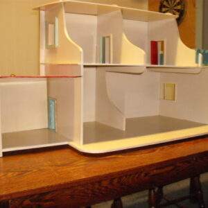 Poppenhuis van rond 1955.