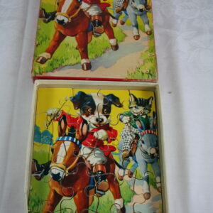 Alternative view of Houten kinder puzzel    hondjes op ezel